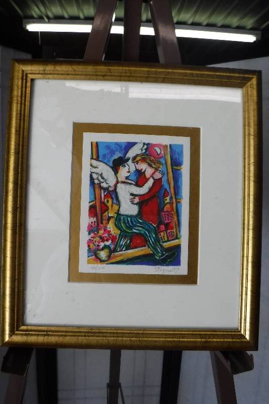 lot 7351 image: Framed, signed and numbered Angel embrace art- bright colors