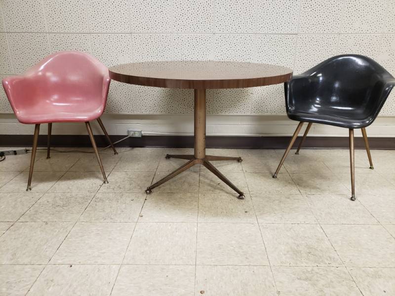 lot 10103 image: Two Fiberglass Molded Chairs and Composite Metal Round Table