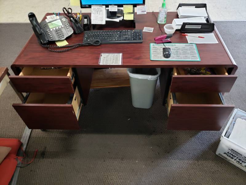 lot 10148 image: Four Drawer Composite Desk Contents Not Included