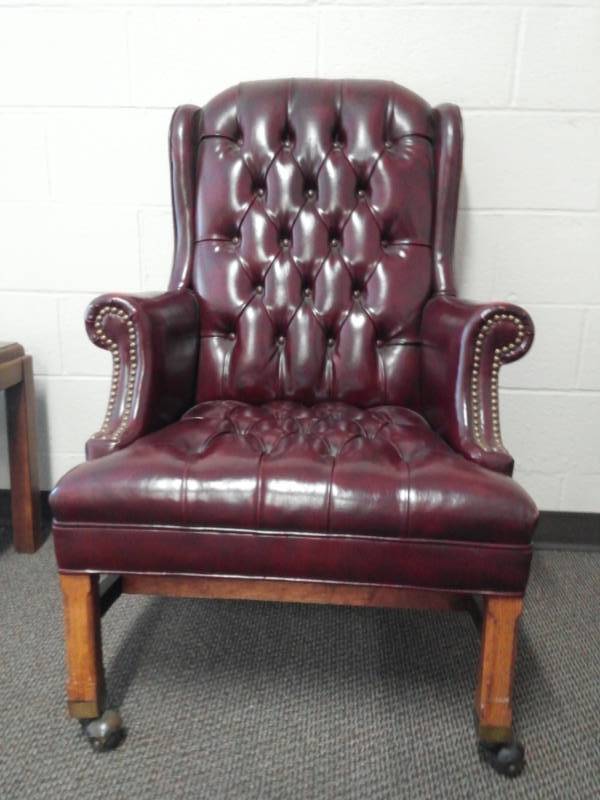 lot 10029 image: Burgundy Leather Wingback Rolling Armchair