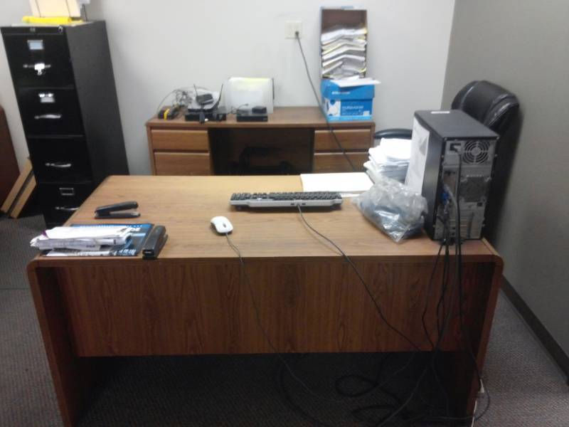 lot 10049 image: Two Wood Desks Contents Not Included