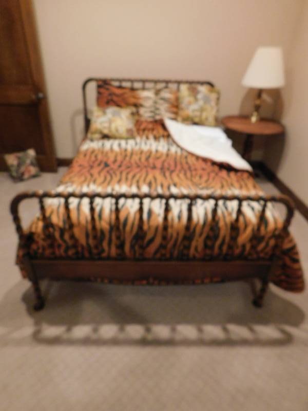lot 3382 image: Queen Sized Wood Bed with Pillows, Sheets and Comforter