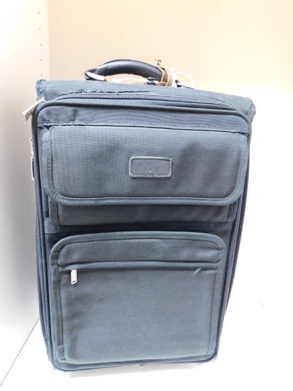 lot 3421 image: Traveler Travel Bag with Handle and Casters