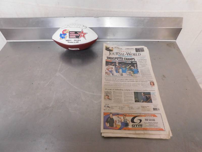 lot 3426 image: The Big Game Kansas University VS Houston Fort Worth Leather Ball and Lawrence Journal World Newspaper March 17, 2013