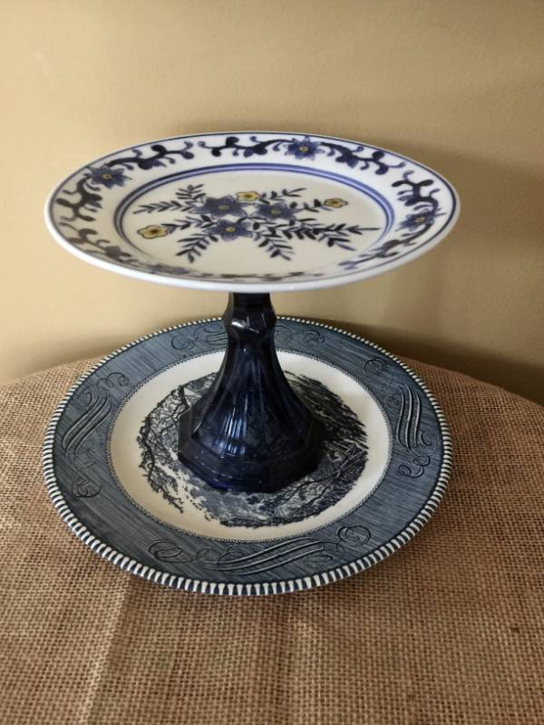 lot 2056 image: Upcycled serving dishcenterpiece with blue dishes