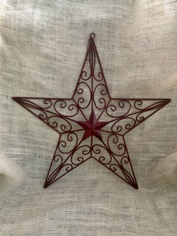 lot 2073 image: 20 Metal hanging star with scroll design