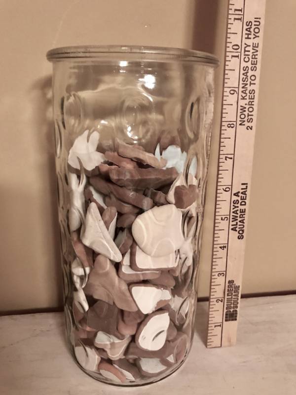lot 2093 image: Glass vase filled with collection of sea weathered tiles