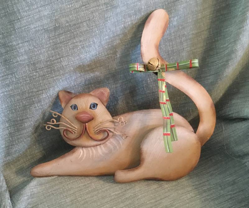 lot 2153 image: Tin Cat with bow and bell on the tail