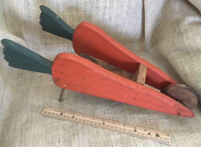 lot 2183 image: Small Decorative Wood Carrot shaped wheeled cart