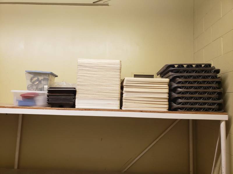lot 6309 image: Assortment of Cutting Boards and Plastic Ware Contents on Shelf