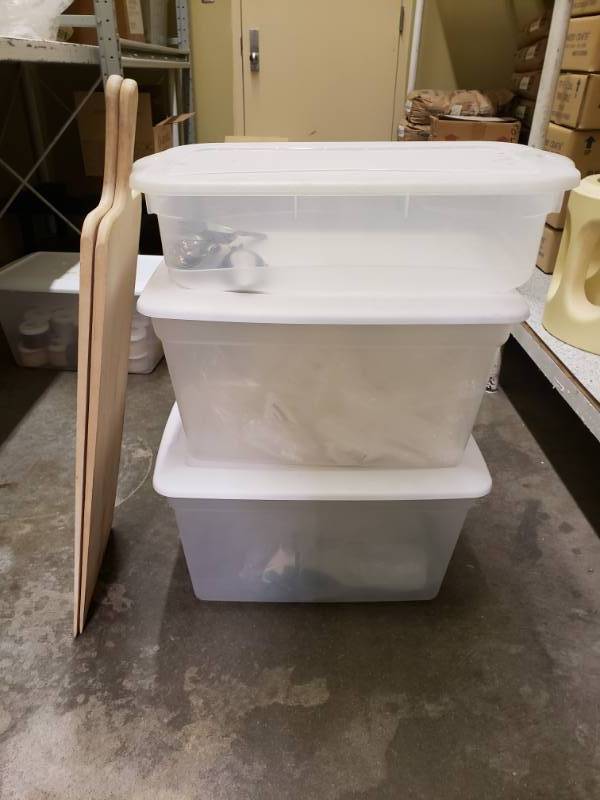 lot 6310 image: 3 Totes (1)Cleaning Spray Bottles( 2)Plastic Scoops (3)Ice Scoops and Two Wooden Pizza Spactulas