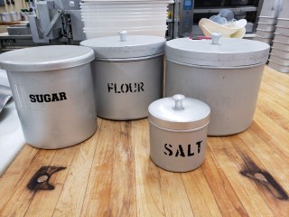 lot 6377 image: Aluminum Cannister Lot of 4