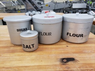 lot 6381 image: Aluminum Cannister Lot of 4