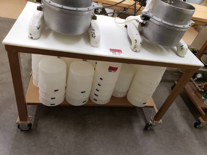 lot 6493 image: Hard Plastic Top Table on Wheels -Contents Not Included