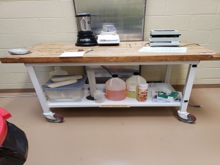 lot 7104 image: Butcher Block Island On Wheels (Table Only)