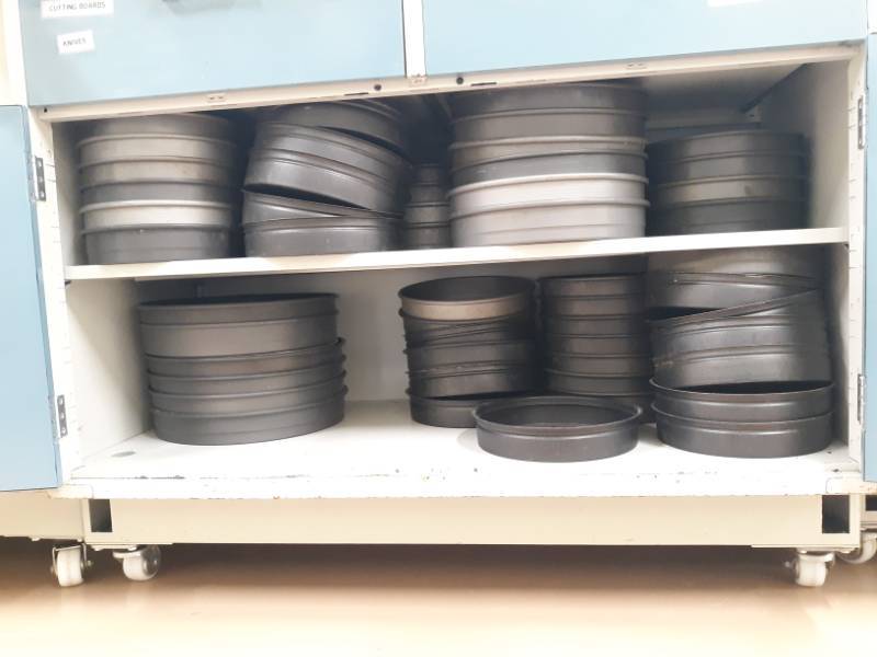 lot 7138 image: Contents Of Cart, Pizza Pans,Measuring Spoons And More, Cart Not Included