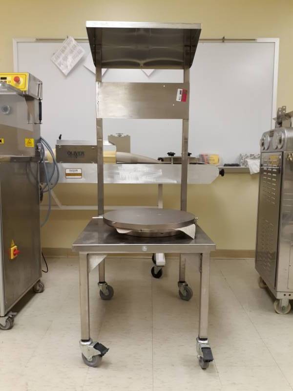 lot 7246 image: Stainless table with rotating round top
