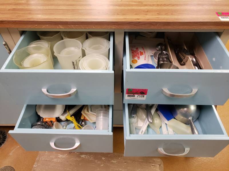 lot 7528 image: Contents of Drawers (Measuring Cups, Scoops, Utensils)