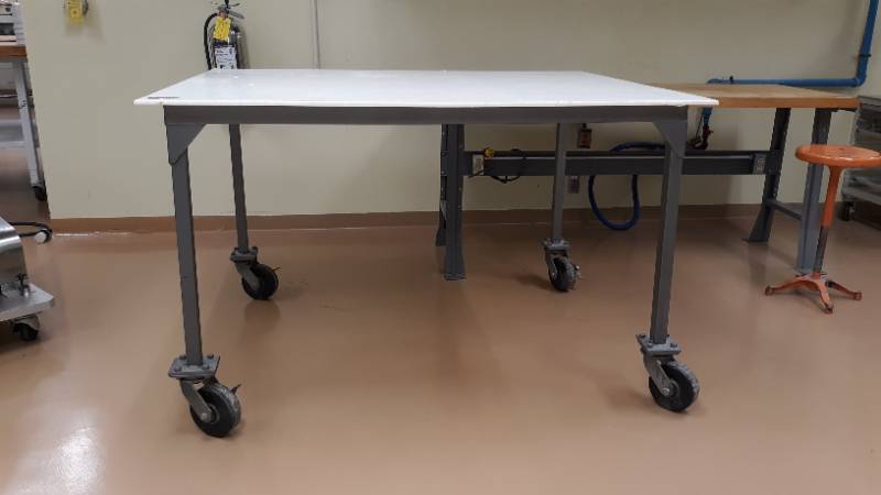 lot 7184 image: Rolling Poly Board Table, White