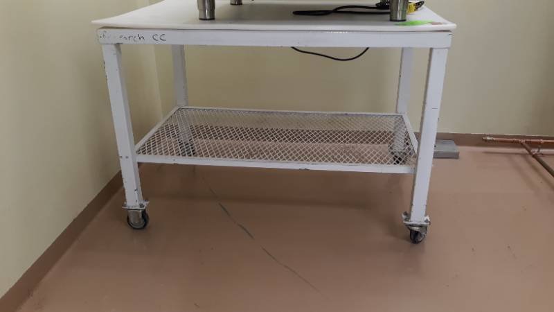 lot 7188 image: Poly Top Rolling Table w Undershelf, Contents not Included