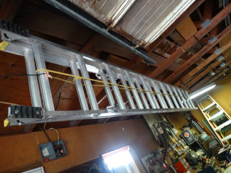 lot 5510 image: Werner aluminum 24 foot extension ladder
