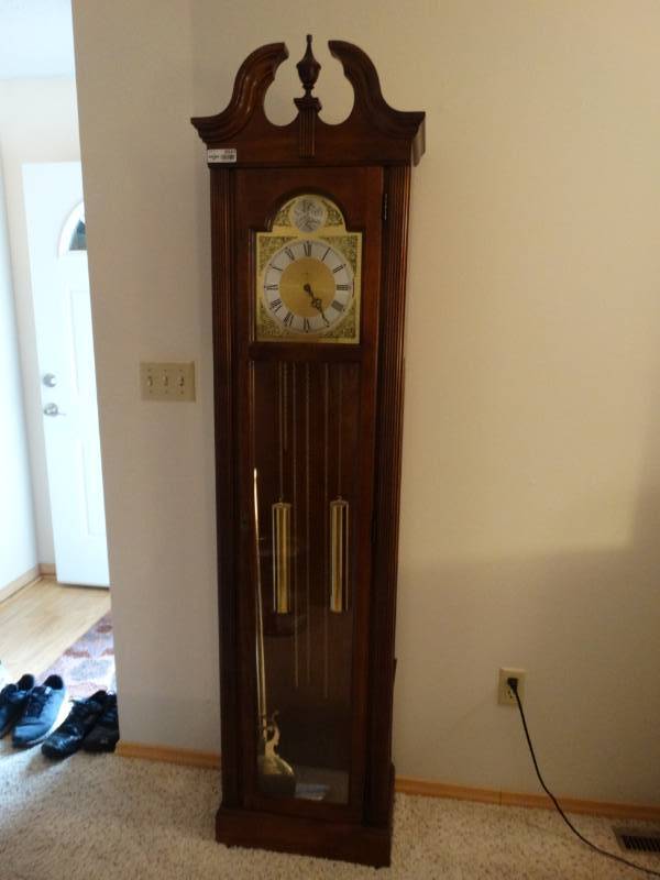 lot 5541 image: Howard Miller grandfather clock