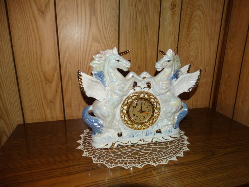 lot 5559 image: Porcelain unicorn clock