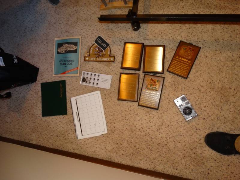 lot 5833 image: Misc plaques , NRA life member memorabilia, reading material