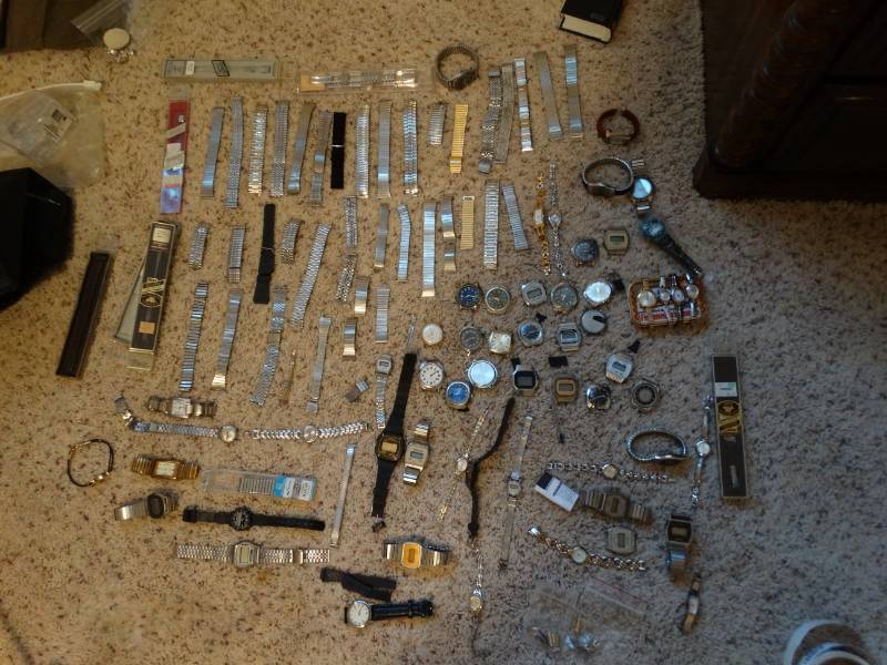 lot 5834 image: Collection of mens & womens wrist watches, bands, faces, misc accessories
