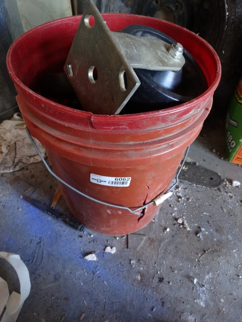 lot 6062 image: Bucket full of various size wheels