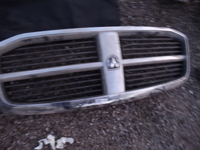 lot 6155 image: Dodge truck grill & behind the seat organizer
