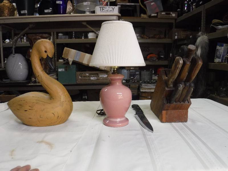 lot 8152 image: Wood swan, small lamp and knife set in wood block