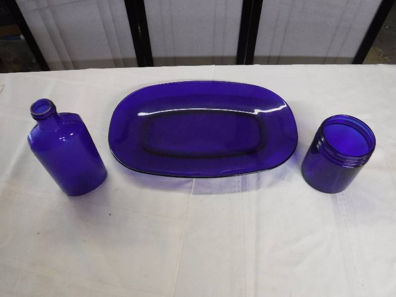 lot 8183 image: Cobalt blue glass bottle, plate and vicks jar