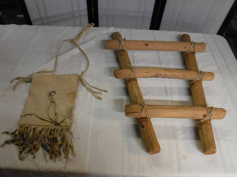 lot 8238 image: Small wood ladder and leather pouch- Native American