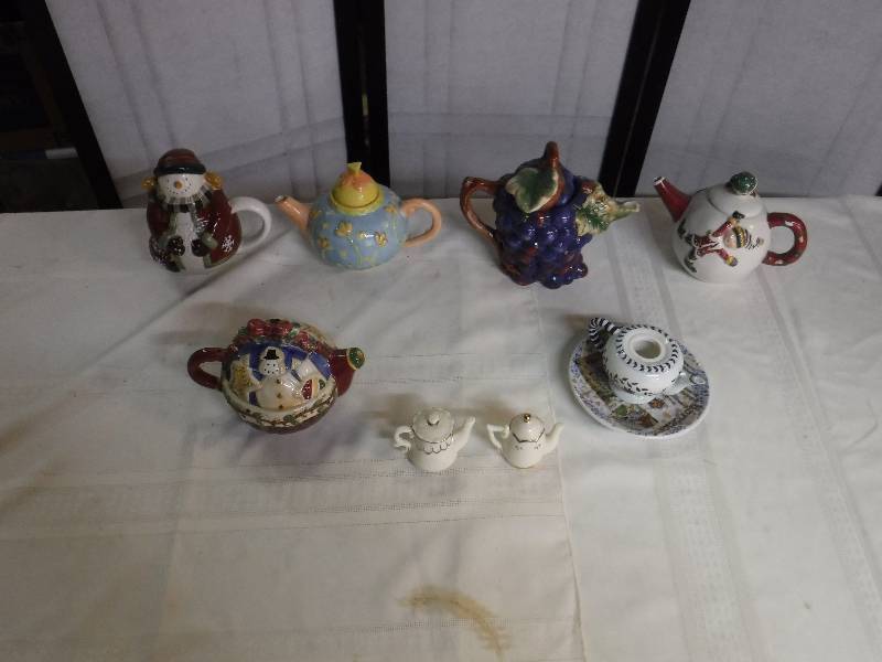 lot 8251 image: Tea pot collection lot- large and small tea pots Snowman one is super cute