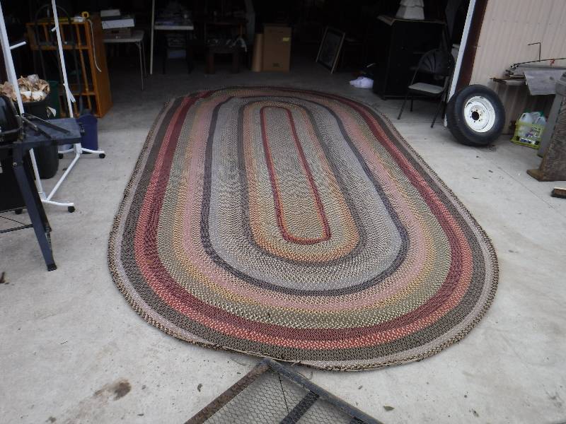 lot 8274 image: Almost 18 foot long oval wool braided rug HUGE