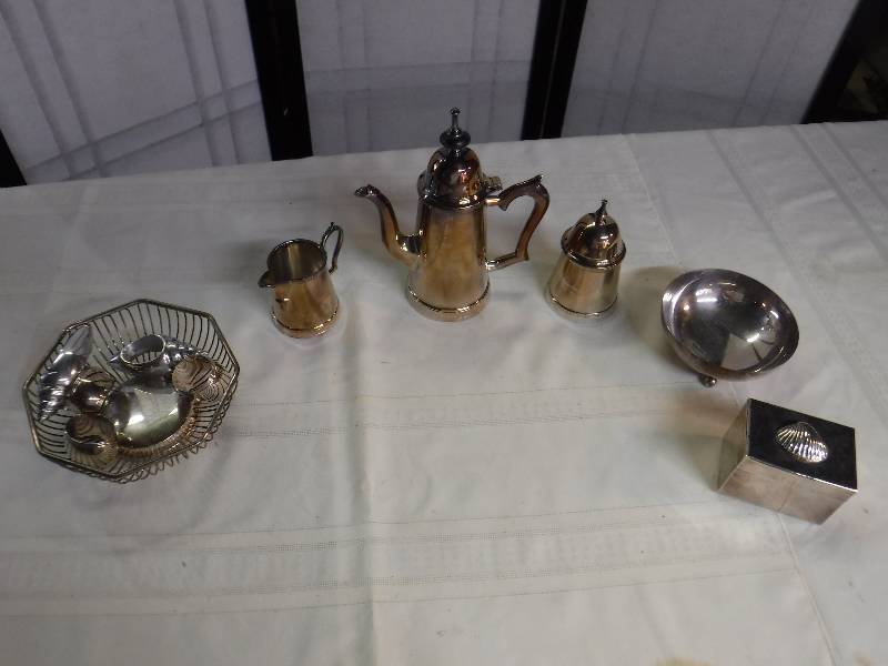 lot 8296 image: Tea pot, wire basket, napkin rings and more 12 items of silver plate