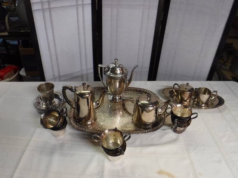 lot 8297 image: 24 pieces of silver plate-includes tea set with cream and sugar