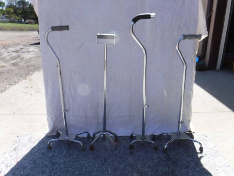 lot 8299 image: various walker walking cane with 4 feet on the bottom