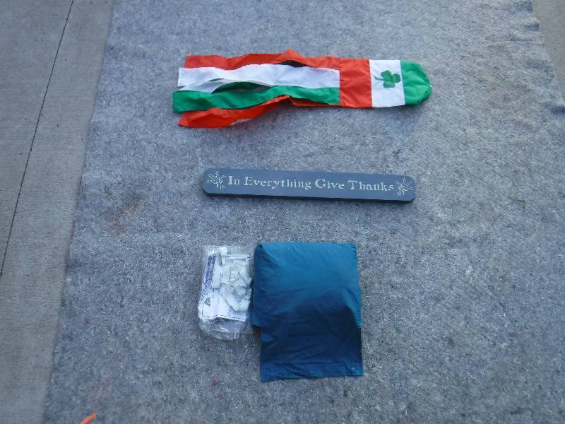 lot 8313 image: Irish wind sock, in everything give thanks sign and a twin size air mattress