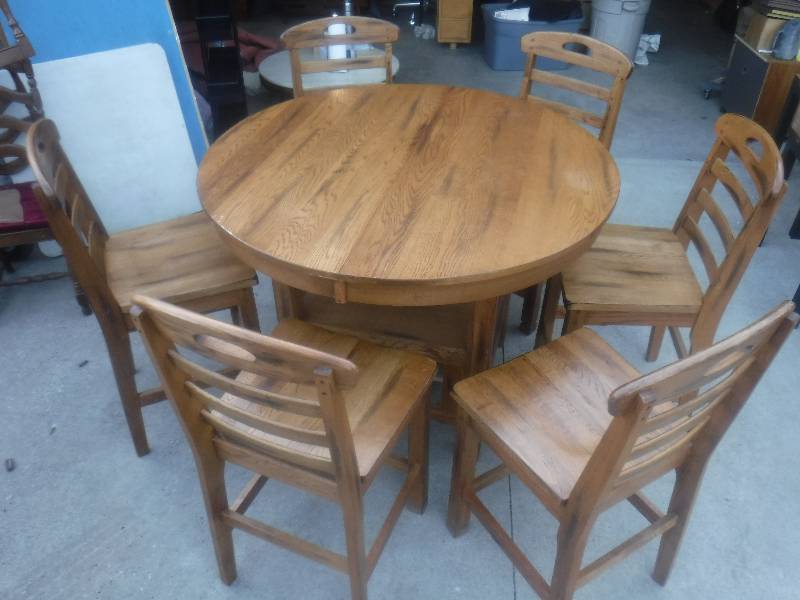 lot 2810 image: Oak Round to oval Bar height dinning table and chair set- Sunny Design by Sedona