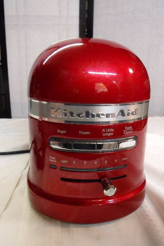 lot 4954 image: Red Kitchenaid pro line 2 slice toaster sells new for $299