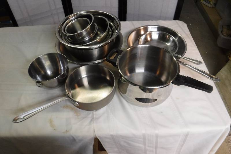 lot 4968 image: Fargor and All Clad pots and pans as well as stainless steel mixing bowls