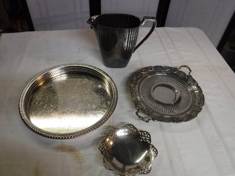 lot 6573 image: Silver plate serving platters, pitcher and small dish