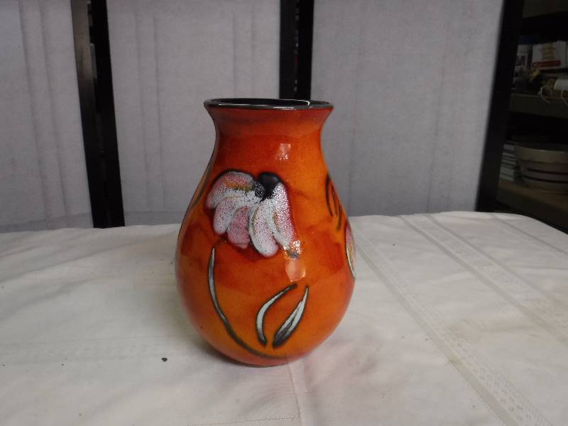 lot 6596 image: Poole Art pottery Vase made in England- orange glaze with flower
