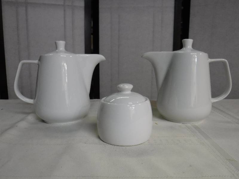 lot 6627 image: pair of white tea pots with sugar dish