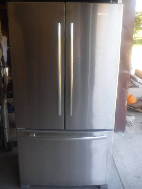 lot 2827 image: Jenn Air stainless french door refrigerator- powers on but will NOT cool