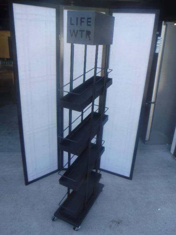 lot 2840 image: Brand new Life water display merchandiser wrack- rolls lot 11