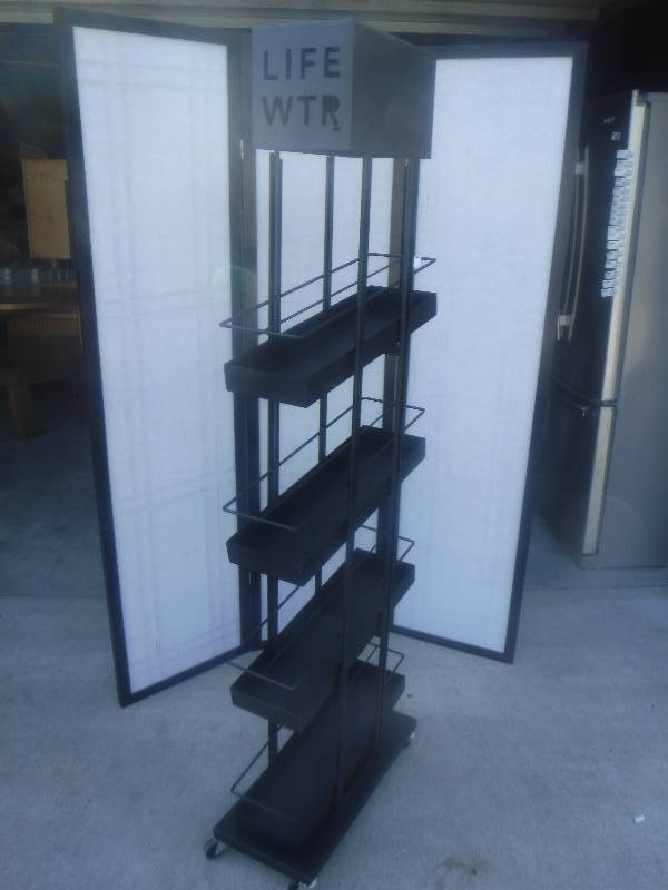 lot 2847 image: Brand new Life water display merchandiser wrack- rolls lot 18