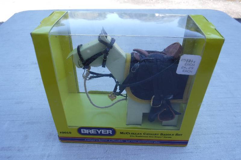 lot 7423 image: Breyer McCullain Cavalry saddle set for toy horse